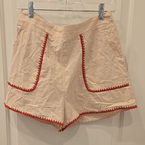 Stylish Cream Shorts And Top Set with Red Trim.